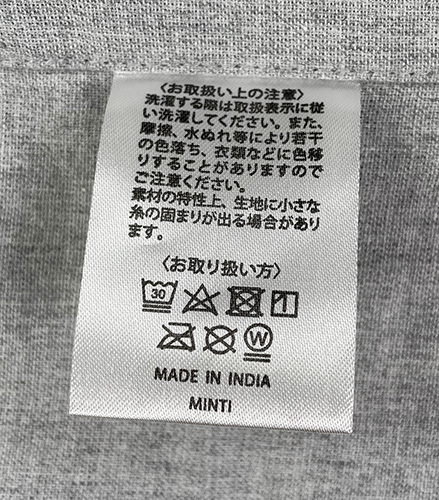 タグの表面には洗濯表示と注意事項